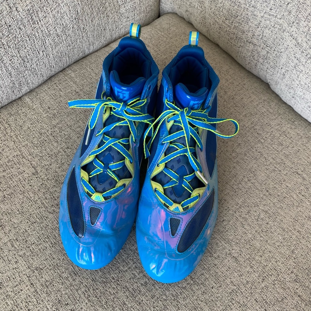 Blue neon adidas cleats